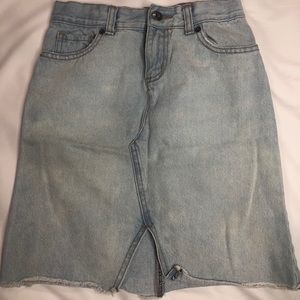 Jeans skirt size 10 with adjustable elastic bands.
